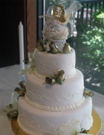 50th wedding anniversary cake in rolled fondant with gold roses