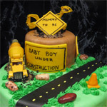 Baby boy under construction fondant 3-D baby shower cake