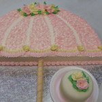 A Parasol Wedding Shower caked with little side cake.