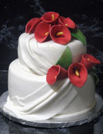 Gum paste Red Calla Lilies on rolled fondant wedding cake