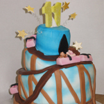 Whimsical roller coaster cake.